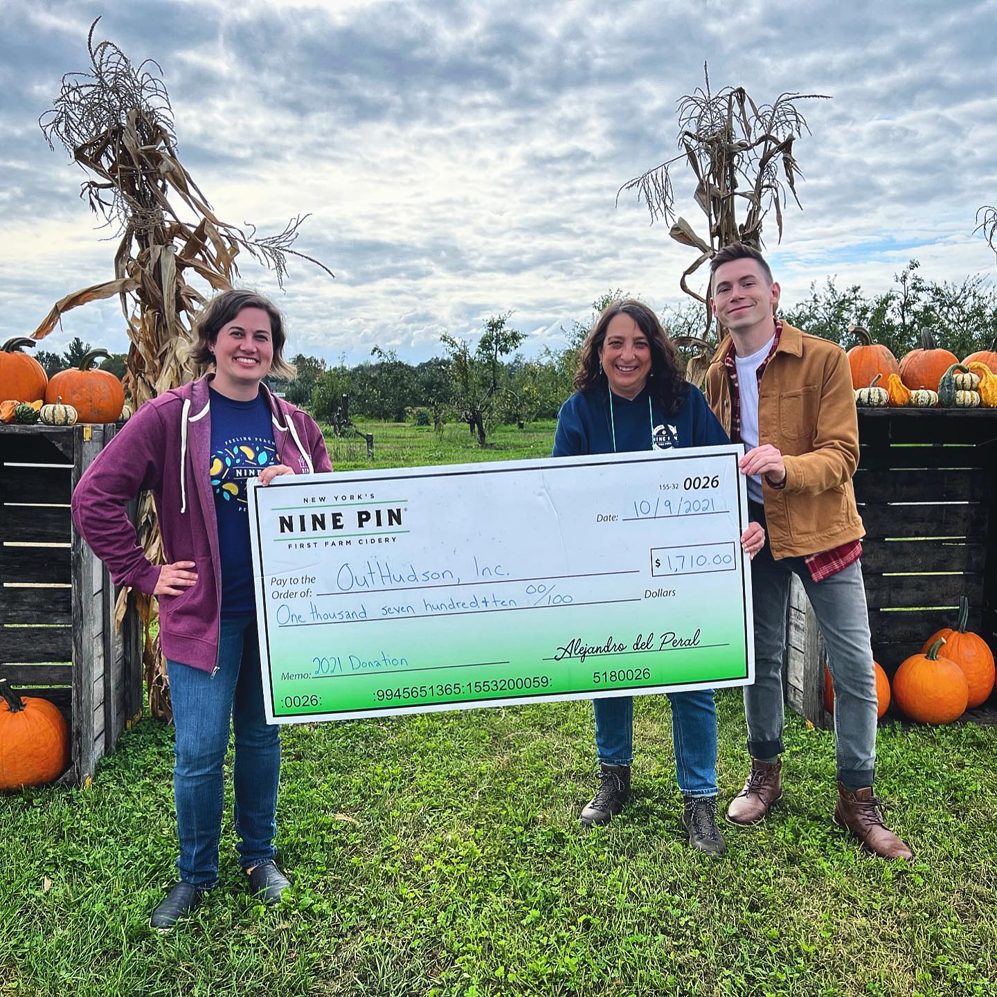 nine pin cider donates check to outhudson